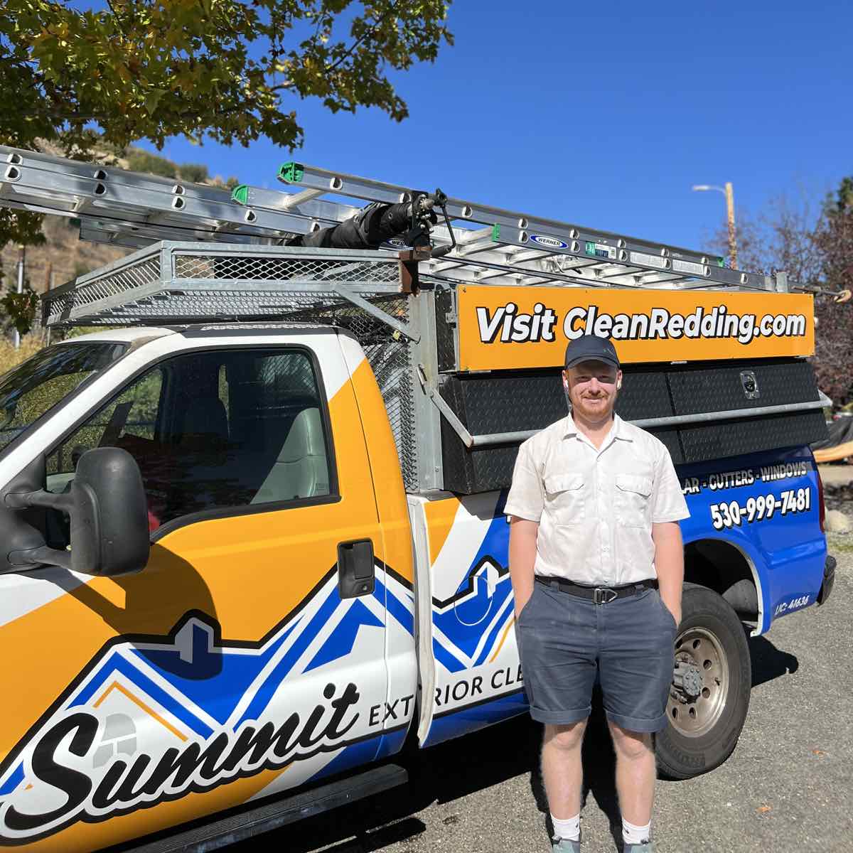 Joe standing next to his Summit Exterior Cleaning truck